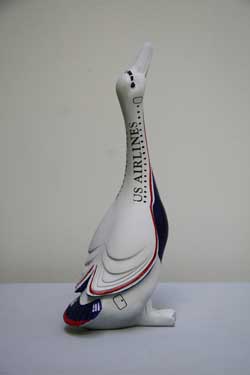 Jinkee Choi’s Canada Goose I 2009, ceramic doll and acrylic paint, 3 x 4 x 10 inches