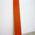 John McCracken, Red Plank 1967. Polyester resin, fiberglass, and plywood, 104-1/4 x 18-1/4 x 3-1/4 inches