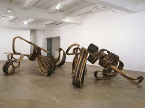 Richard Deacon Red Sea Crossing, 2003, oak and stainless steel, sculpture in two parts: 64 x 136 x 126 inches, 80-1/4 x 204-3/4 x 153-1/2 inches, Courtesy Marian Goodman Gallery