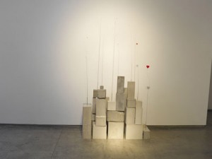 Julianne Swartz, Garden of Infinite Hearts, 2007, Cement, steel wire, clock movement, found objects, wire, acetate, 71 x 40 x 14 Inches