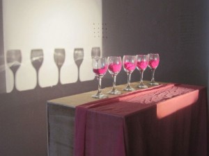 Suzanne Stroebe, Marriage of Convenience, 2010. Luan, silk, cordial glasses, dry pigment, slide projector, dimensions variable (detail). Courtesy of the Artist