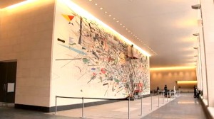 still from a 2010 film by PBS Art21 showing work in progress on Julie Mehretu's Goldman Sachs Mural