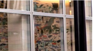 still from a 2010 film by PBS Art21 showing work in progress on Julie Mehretu's Goldman Sachs Mural