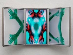 Pipilotti Rist, All or Nothing (alles oder nichts), 2010. Video installation; metal triptych with 3 LCD screens, 3 integrated players, 9 1/2 X 16 7/8 X 3 7/8 inches. Courtesy of Luhring Augustine