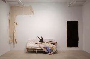 Gedi Sibony (with Diana Lyon), Who Attracts All That is Named, It Speaks of Them as The Three Bodies, 2010. Canvas, sofa, foam, tape, and cloth, vinyl, dimensions variable. Courtesy Greene Naftali Gallery, New York. Photo: John Berens