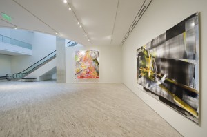 installation shot of the exhibition under review, Kristin Baker: New Paintings, at the Museum of Fine Arts, Boston, showing, from left to right: Full Dawn Parallax, 2010. Acrylic on acrylic with powder-coated aluminum frame, and Within Refraction, 2010. Acrylic and charcoal on PVC. Courtesy of the artist and Suzane Geiss Co., New York. © Kristin Baker. *Photograph © Museum of Fine Arts, Boston