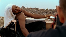 Muniz taking the photograph of Tiao at Jardim Gramacho, from the film under review. Courtesy of Arthouse Films.