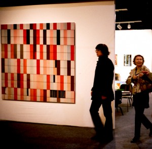 Visitors at AIPAD Photography Show New York, Park Avenue Armory, March 16-20, 2011. Photo by Robin Siegel
