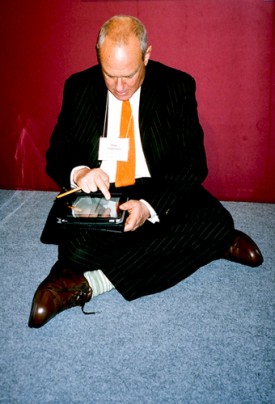 From AIPAD to iPad: Peter Fetterman at work. Photo by Robin Siegel