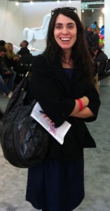 Independent curator Amanda G. Schneider, ever ready with a smile