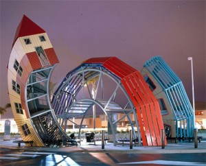 Dennis Oppenheim, Bus Home, 2002. Steel, painted steel, acrylic, Lexan, corrugated steel, 35 x 50 x 100 feet. Pacific View Mall, Buenaventura, California. Photo: Focus on the Masters. Courtesy of Dennis Oppenheim Studio.