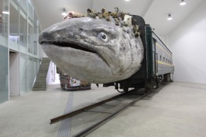 Huang Yong Ping, Leviathanation, 2011. Installation of fiberglass, stuffed animals, train, 47 x 210 x 34 m. Courtesy Tang Contemporary Art, Beijing.