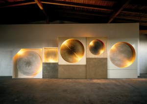 Günther Uecker, Five Light Disks, Cosmic Vision, 1961-1981. Nails on cavnas on wood, wooden case, electric motor, spotlight, 94-1/2 x 283-1/2 x 15-3/4 inches. Courtesy of L&M Arts, New York