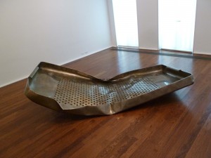 Subodh Gupta, Repose, 2011. Stainless steel, 29 x 102 x 50 inches. Courtesy of Hauser & Wirth New York.