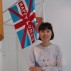 Eunah Kim with her "Happy Lungs" flag, Cambridge, Mass., May, 2009. Courtesy of Hyewon Li