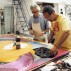 Frank Stella, right, and Kenneth Tyler at work on a print. Courtesy of Kenneth Tyler