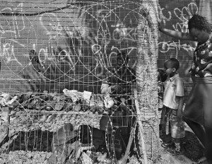 David Goldblatt, Shoemaker, Raleigh Street, Yeoville, Johannesburg. 14 September 2006. Silver gelatin print on fibre based paper, 40 x 50 cm. Courtesy of Goodman Gallery, Johannesburg