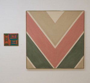 Installation shot of Black Mountain College and Its Legacy exhibition, Loretta Howard Gallery, New York, 2011 showing two works by Kenneth Noland: V. V., 1949. Oil on canvas, 15 x 18 inches and (right) Soft Touch, 1963. Magna on canvas, 69 x 69 inches.
