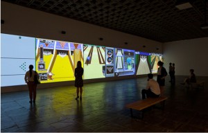 Cory Arcangel, Various Self Playing Bowling Games (aka Beat the Champ), 2011 (installation view, Whitney Museum of American Art, New York). Hacked video game controllers, game consoles, cartridges, discs, and video, dimensions variable. Collection of the artist; Team Gallery, New York; Lisson Gallery, London; and Galerie Thaddaeus Ropac, Salzburg and Paris. Photograph by Sheldan C. Collins