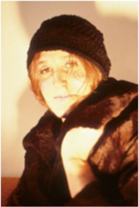 Martha Wilson, Captivating a Man, 1972. Color photograph and text, 20-1/2 x 14-1/2 inches.