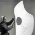 Barbara Hepworth holding a file with the plaster for Curved Form (Bryher II) (November 1961) © Bowness, Hepworth Estate