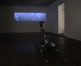 Simone Jones, End of Empire, 2011 (in collaboration with Lance Winn). Custom-made robotic dolly and track, digital projector, video run time: 14 minutes. Photo: Eleanore Hopper. Courtesy Ronald Feldman Fine Arts, New York