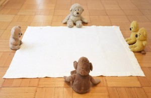 Mike Kelley, Arena #7, 1990. Found stuffed animals, wood, and blanket 11 1/2 x 53 x 49 inches. Courtesy of Skarstedt Gallery, New York