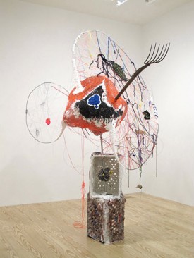 Michelle Segre, The Collector, 2012. Milk crates, plaster, paint, clay, pitchforks, plastacine, rocks, acrylic, paper maché, plastic lace, yarn, thread, wire, toothpicks, seashells, 102.5 x 81 x 69 inches. Courtesy of Derek Eller Gallery.