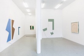 Installation shot of Noam Rappaport's exhibition at James Fuentes including, far left, Untitled (Blue and Brown), 2012, ?oil and colored pencil on canvas, 104 x 58 inches, and second from right, Untitled, 2012, same materials, 102 x 64 inches (overall). Courtesy of James Fuentes