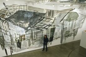 Denyse Thomasos in front of her monumental wall-painting at Rotunda Gallery, Brooklyn in 2006. Courtesy of Lennon, Weinberg Inc.