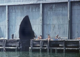 Shelley Seccombe, Sunbathing on the Edge, Pier 52, 1977. Contemporary archival digital print, edition of 25, 11 x 15 inches. Courtesy of the artist