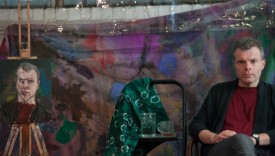 David Cohen with his newly painted portrait by Nick Miller. Photo by, and courtesy of, Nick Miller