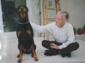 Hugh Gourley with the author's Doberman Pinscher, Mookie. Courtesy of Daphne Cumming