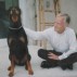 Hugh Gourley with the author's Doberman Pinscher, Mookie. Courtesy of Daphne Cumming