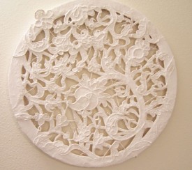 Katherine Mangiardi, Rose (raised) Point Lace, 17th Century, 2012. Plaster and acrylic on canvas, 16 inches diameter. Courtesy of Bernarducci Meisel Gallery