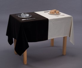 Víctor Grippo (Argentinean, 1936–2002), Analogía IV (III) [Analogy IV (III)], 1972, Wood table, ceramic and acrylic dishes, metal silverware, cotton and velvet tablecloths, natural and acrylic potatoes; installation dimensions 29 3/4 x 37 1/8 x 23 3/16 in. (75.6 x 94.3 x 58.9 cm). Edition 3/5, Colección Patricia Phelps de Cisneros