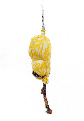Shinique Smith, This Yellow Shell, 2013. Clothing, fabric, bamboo, ribbon, rope and twine, 65 x 15 1/2 x 12 inches.
