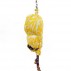 Shinique Smith, This Yellow Shell, 2013. Clothing, fabric, bamboo, ribbon, rope and twine, 65 x 15 1/2 x 12 inches.