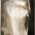 Keith Smith, Alan Undressing, 1978. Gelatin silver print with sheet film and stitching, printed c. 1978, 7-1/8 x 4-7/8 inches. Courtesy of Bruce Silverstein