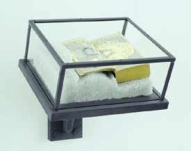 Matthew Barney, Ancient Evenings: Ba Libretto, 2009, ink, graphite and gold leaf on paperback copy of Ancient Evenings by Norman Mailer, on carved salt base, in nylon and acrylic vitrine 15 1/2 x 13 3/4 x 14 3/4 inches. Collection of Marguerite Steed Hoffman, Dallas, TX. Copyright Matthew Barney.