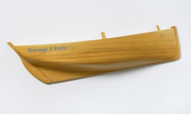 Ian Hamilton Finlay, Hommage A Rivière, 2002, wooden half boat, 7 7/8 x 30 3/4 x 4 3/4 inches, IF4633. Image courtesy of David Nolan Gallery.