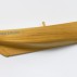 Ian Hamilton Finlay, Hommage A Rivière, 2002, wooden half boat, 7 7/8 x 30 3/4 x 4 3/4 inches, IF4633. Image courtesy of David Nolan Gallery.