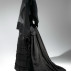 Mourning Ensemble, 1870-1872. Black silk crape, black mousseline. Veil, ca. 1875. Black silk crape. Photo: © The Metropolitan Museum of Art, by Karin L. Willis.