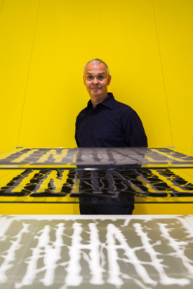 Artist Bruce Pearson with hgis work installed in Spaced Out - Migration To The Interior Photo: Greg Mionske / Red Bull Content Pool