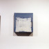Installation shot of three works, each 9 x 9 inches, 2014, in the exhibition under review