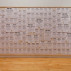Stephanie Syjuco, Free Texts, 2011-12. Varying-sized printouts, free downloadable PDF files of texts found online, and tear-off tab flyers, 192 x 96 inches. Courtesy of the artist and Catharine Clark Gallery.