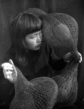 Ruth Asawa, Holding a Form-Within-Form Sculpture, 1952 © 2015 Imogen Cunningham Trust. Photo: Imogen Cunningham