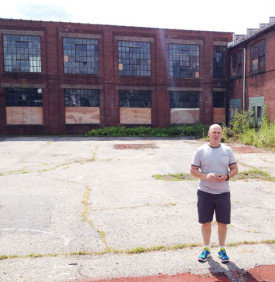 Kevin Daly, co-founder of Ball and Socket Arts, in front of their future home in Cheshire, Conn. Photo: Stephen Maine