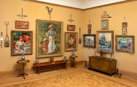 Installation shot, permanent collection, Barnes Foundation, showing examples of ironwork and paintings hung together by Albert C. Barnes