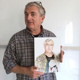 Walter Robinson holding "Watercolor Portrait a Day" #184 by Brenda Zlamany. Photo: Brenda Zlamany